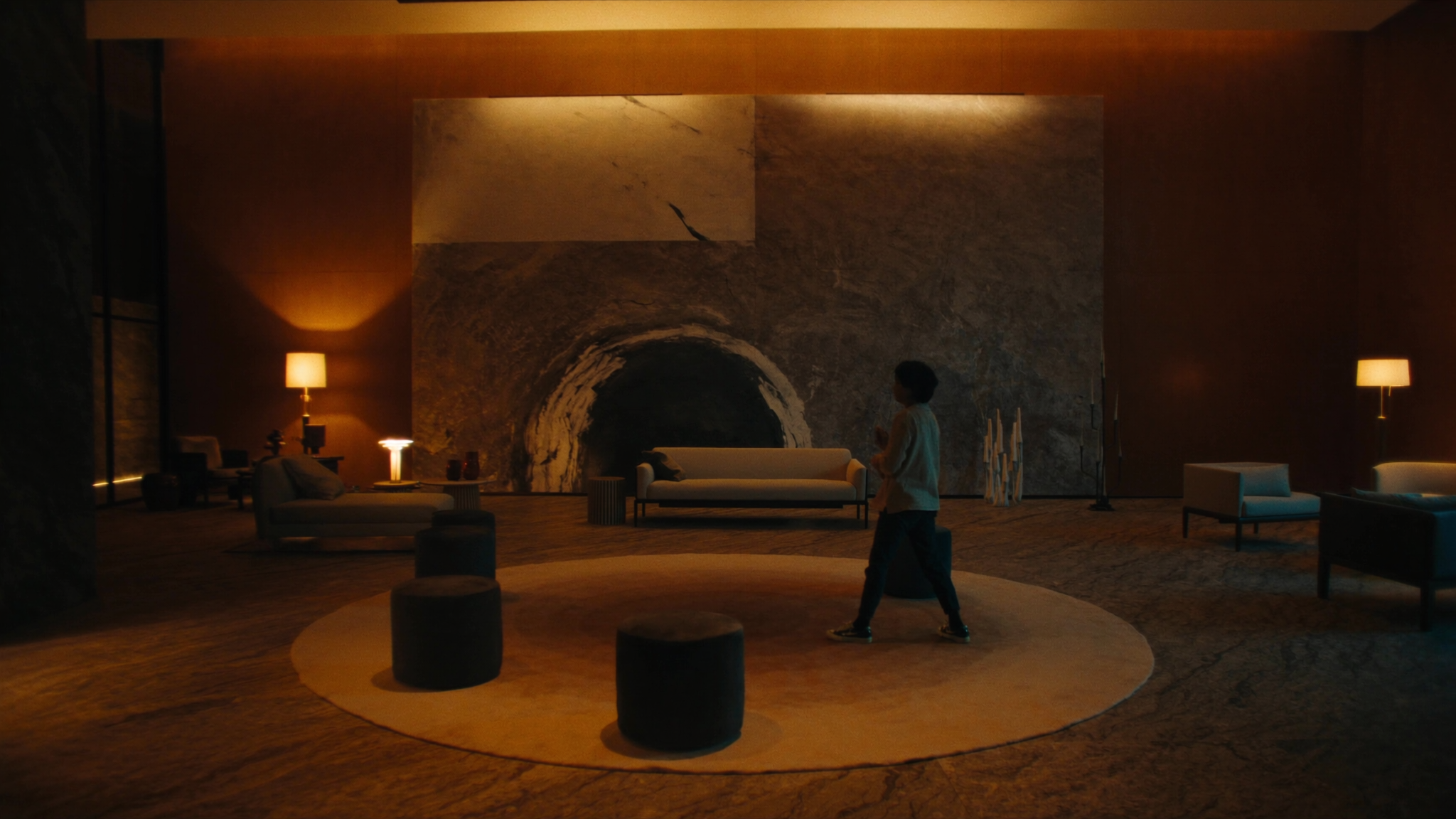 A painting installed in a hotel lobby, low warm light